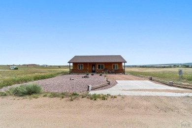 This charming 3-bed, 2-bath ranch offers modern finishes, a on Hollydot Golf Course in Colorado - for sale on GolfHomes.com, golf home, golf lot