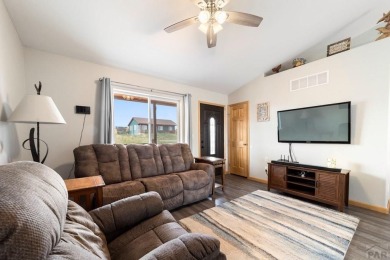 This charming 3-bed, 2-bath ranch offers modern finishes, a on Hollydot Golf Course in Colorado - for sale on GolfHomes.com, golf home, golf lot