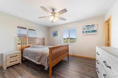 This charming 3-bed, 2-bath ranch offers modern finishes, a on Hollydot Golf Course in Colorado - for sale on GolfHomes.com, golf home, golf lot