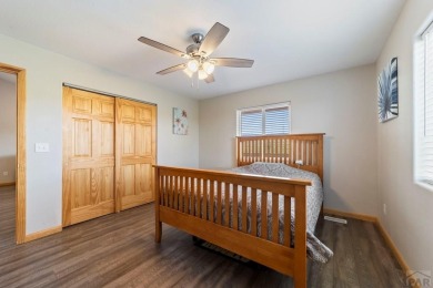This charming 3-bed, 2-bath ranch offers modern finishes, a on Hollydot Golf Course in Colorado - for sale on GolfHomes.com, golf home, golf lot
