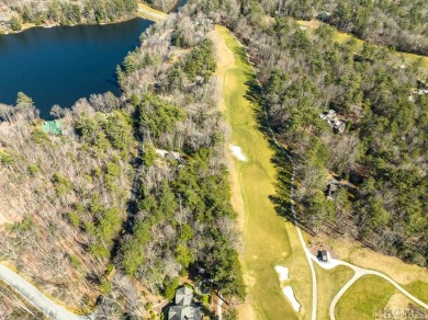 This .57-acre lot nestled on Fairway Drive sits on 4 golf hole on Lake Toxaway Country Club in North Carolina - for sale on GolfHomes.com, golf home, golf lot