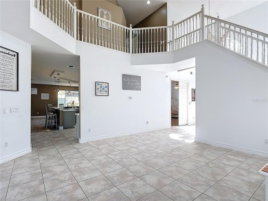 Stunning 5-Bedroom Pool Home on Expansive Corner Lot with Water on Oaks National Golf Course in Florida - for sale on GolfHomes.com, golf home, golf lot