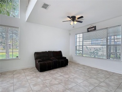 Stunning 5-Bedroom Pool Home on Expansive Corner Lot with Water on Oaks National Golf Course in Florida - for sale on GolfHomes.com, golf home, golf lot
