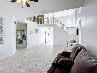 Stunning 5-Bedroom Pool Home on Expansive Corner Lot with Water on Oaks National Golf Course in Florida - for sale on GolfHomes.com, golf home, golf lot