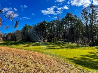 This .57-acre lot nestled on Fairway Drive sits on 4 golf hole on Lake Toxaway Country Club in North Carolina - for sale on GolfHomes.com, golf home, golf lot