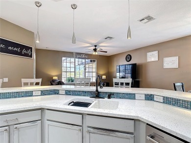 Stunning 5-Bedroom Pool Home on Expansive Corner Lot with Water on Oaks National Golf Course in Florida - for sale on GolfHomes.com, golf home, golf lot