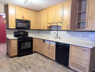 4 Bedroom * 2 Bath Quad Level Home For Sale * Lakes Of The Four on Lakes of the Four Seasons Country Club in Indiana - for sale on GolfHomes.com, golf home, golf lot