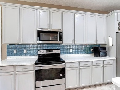 Stunning 5-Bedroom Pool Home on Expansive Corner Lot with Water on Oaks National Golf Course in Florida - for sale on GolfHomes.com, golf home, golf lot