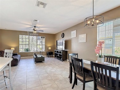 Stunning 5-Bedroom Pool Home on Expansive Corner Lot with Water on Oaks National Golf Course in Florida - for sale on GolfHomes.com, golf home, golf lot