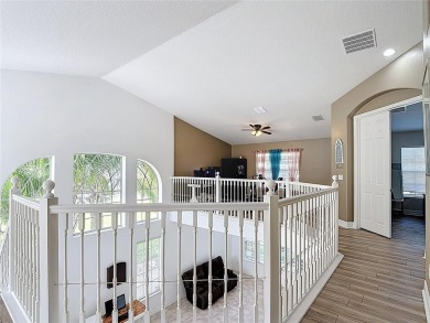 Stunning 5-Bedroom Pool Home on Expansive Corner Lot with Water on Oaks National Golf Course in Florida - for sale on GolfHomes.com, golf home, golf lot