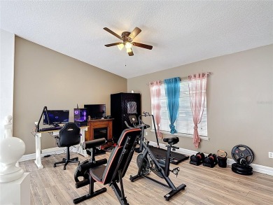 Stunning 5-Bedroom Pool Home on Expansive Corner Lot with Water on Oaks National Golf Course in Florida - for sale on GolfHomes.com, golf home, golf lot