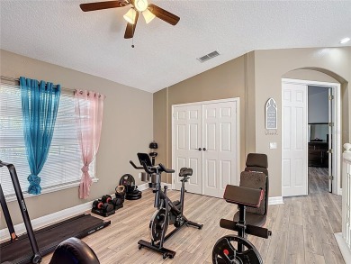 Stunning 5-Bedroom Pool Home on Expansive Corner Lot with Water on Oaks National Golf Course in Florida - for sale on GolfHomes.com, golf home, golf lot