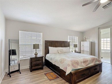 Stunning 5-Bedroom Pool Home on Expansive Corner Lot with Water on Oaks National Golf Course in Florida - for sale on GolfHomes.com, golf home, golf lot