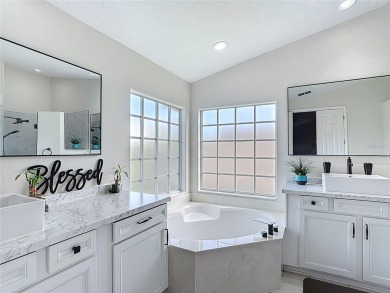 Stunning 5-Bedroom Pool Home on Expansive Corner Lot with Water on Oaks National Golf Course in Florida - for sale on GolfHomes.com, golf home, golf lot