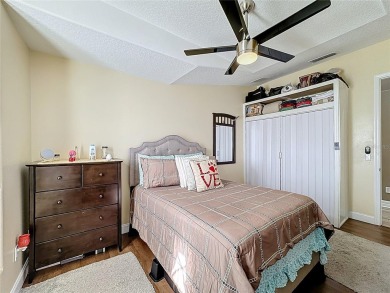 Stunning 5-Bedroom Pool Home on Expansive Corner Lot with Water on Oaks National Golf Course in Florida - for sale on GolfHomes.com, golf home, golf lot