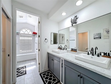 Stunning 5-Bedroom Pool Home on Expansive Corner Lot with Water on Oaks National Golf Course in Florida - for sale on GolfHomes.com, golf home, golf lot