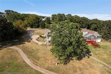 Welcome to the TOURNAMENT PLAYERS CLUB, an exclusive community on Eagle Crest Golf Course in Arkansas - for sale on GolfHomes.com, golf home, golf lot