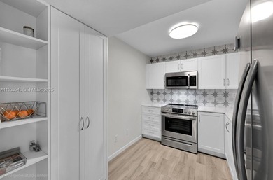 Discover refined living in this fully renovated 2-bedroom on Pembroke Lakes Golf Club in Florida - for sale on GolfHomes.com, golf home, golf lot