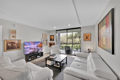 Discover refined living in this fully renovated 2-bedroom on Pembroke Lakes Golf Club in Florida - for sale on GolfHomes.com, golf home, golf lot