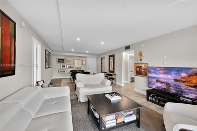 Discover refined living in this fully renovated 2-bedroom on Pembroke Lakes Golf Club in Florida - for sale on GolfHomes.com, golf home, golf lot