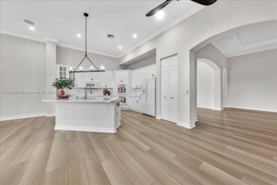 UPDATED AND MOVE-IN READY! This immaculate 4BD/3BA one-story on Heron Bay Golf Club in Florida - for sale on GolfHomes.com, golf home, golf lot