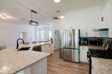 Welcome to this beautifully updated 4-bedroom, 2.5-bathroom home on Haile Plantation Golf and Country Club in Florida - for sale on GolfHomes.com, golf home, golf lot