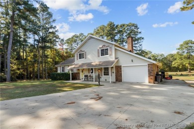 This large 4 bedroom home has a great layout and 3 full on Cypress Lakes Golf Course in North Carolina - for sale on GolfHomes.com, golf home, golf lot