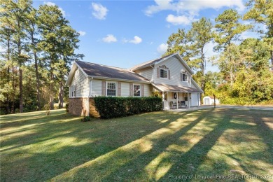 This large 4 bedroom home has a great layout and 3 full on Cypress Lakes Golf Course in North Carolina - for sale on GolfHomes.com, golf home, golf lot