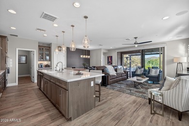 Set on a rare golf course lot, this stunning Evia floorplan on Vista Verde Golf Course in Arizona - for sale on GolfHomes.com, golf home, golf lot