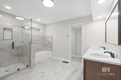 Welcome to this beautifully updated 4/2 home in the highly on Lake Forest Yacht and Country Club in Alabama - for sale on GolfHomes.com, golf home, golf lot