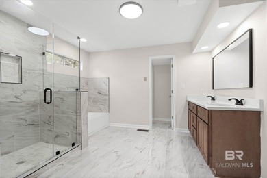 Welcome to this beautifully updated 4/2 home in the highly on Lake Forest Yacht and Country Club in Alabama - for sale on GolfHomes.com, golf home, golf lot