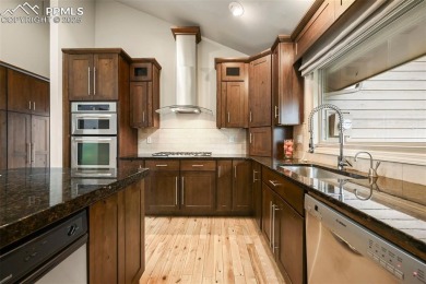Absolutely stunning and perfectly situated in the sought-after on Kissing Camels Golf Course in Colorado - for sale on GolfHomes.com, golf home, golf lot