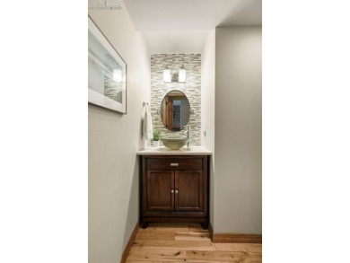 Absolutely stunning and perfectly situated in the sought-after on Kissing Camels Golf Course in Colorado - for sale on GolfHomes.com, golf home, golf lot