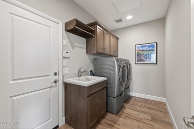 Set on a rare golf course lot, this stunning Evia floorplan on Vista Verde Golf Course in Arizona - for sale on GolfHomes.com, golf home, golf lot