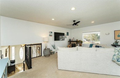 Spacious split-level home featuring 5 bedrooms and 2 bathrooms on Dodge Country Club in Minnesota - for sale on GolfHomes.com, golf home, golf lot