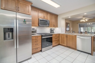 This stunning 4-bedroom, 3.5-bath townhome offers exceptional on The Moors Golf Club in Michigan - for sale on GolfHomes.com, golf home, golf lot