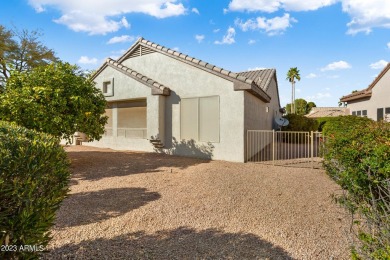 Stonecrest model is situated on a spacious lot with a fenced on Sun City Grand Golf Couse and Club in Arizona - for sale on GolfHomes.com, golf home, golf lot