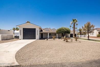 Welcome to 2341 Green Place, an exquisitely remodeled four on London Bridge Golf Course in Arizona - for sale on GolfHomes.com, golf home, golf lot