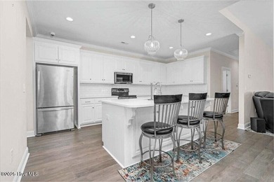 Step into easy one-level living in this 2023 carriage-style home on The Golf Club At Rocky Mount in North Carolina - for sale on GolfHomes.com, golf home, golf lot