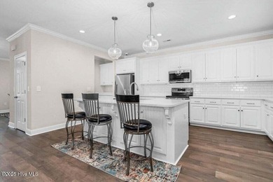 Step into easy one-level living in this 2023 carriage-style home on The Golf Club At Rocky Mount in North Carolina - for sale on GolfHomes.com, golf home, golf lot