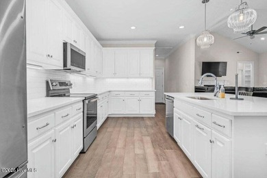 Step into easy one-level living in this 2023 carriage-style home on The Golf Club At Rocky Mount in North Carolina - for sale on GolfHomes.com, golf home, golf lot