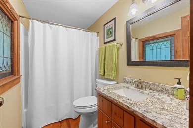 Discover the perfect mountain escape in this charming 3-bedroom on Big Canoe Golf Club - Cherokee in Georgia - for sale on GolfHomes.com, golf home, golf lot