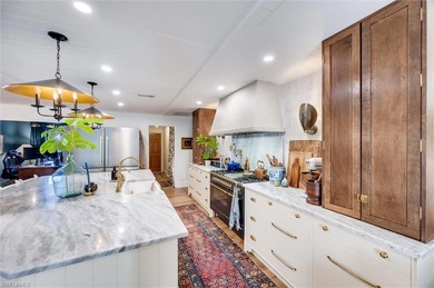 Welcome to this truly one-of-a-kind residence in Eagle Ridge on Eagle Ridge Golf and Tennis Club in Florida - for sale on GolfHomes.com, golf home, golf lot