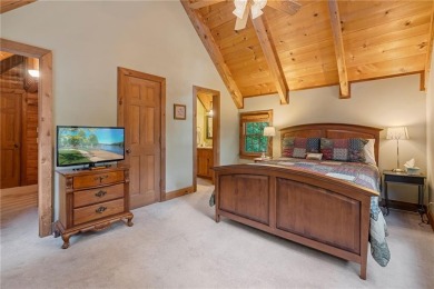 Discover the perfect mountain escape in this charming 3-bedroom on Big Canoe Golf Club - Cherokee in Georgia - for sale on GolfHomes.com, golf home, golf lot