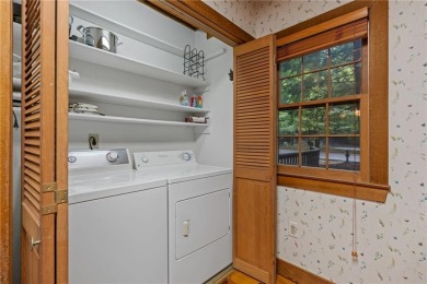 Discover the perfect mountain escape in this charming 3-bedroom on Big Canoe Golf Club - Cherokee in Georgia - for sale on GolfHomes.com, golf home, golf lot