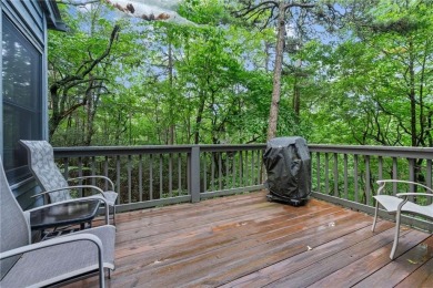 Discover the perfect mountain escape in this charming 3-bedroom on Big Canoe Golf Club - Cherokee in Georgia - for sale on GolfHomes.com, golf home, golf lot
