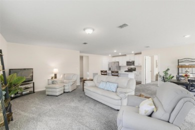 Short Sale. This beautiful home is perfectly situated on an on Grand Reserve Golf Course in Florida - for sale on GolfHomes.com, golf home, golf lot