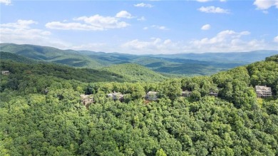 Discover the perfect mountain escape in this charming 3-bedroom on Big Canoe Golf Club - Cherokee in Georgia - for sale on GolfHomes.com, golf home, golf lot