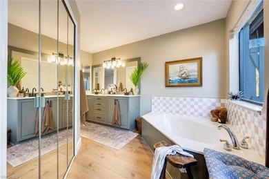 Welcome to this truly one-of-a-kind residence in Eagle Ridge on Eagle Ridge Golf and Tennis Club in Florida - for sale on GolfHomes.com, golf home, golf lot