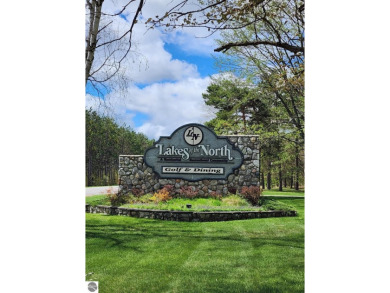 Golf, Hunt  Relax!  Nestled in the heart of Lakes of the North on Lakes of the North Deer Run Golf Course in Michigan - for sale on GolfHomes.com, golf home, golf lot